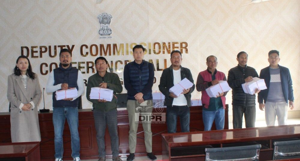 ADC & ERO Kiphire, Longdiba L Sangtam, NCS with other officials during the distribution of Final Electoral Roll 2025 at DC's Conference Hall, Kiphire. (DIPR Photo)